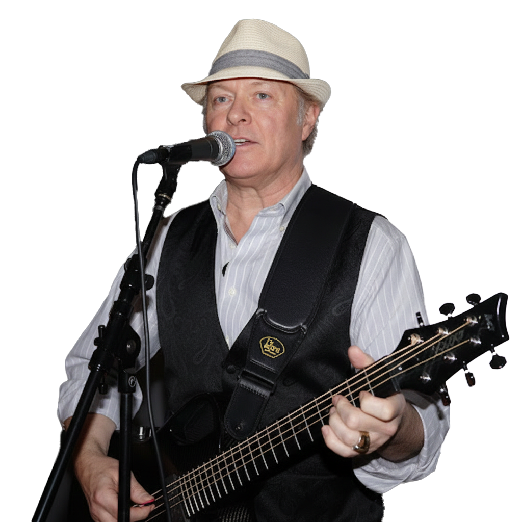 Tommy Randall playing a 12-string guitar with a soft glow